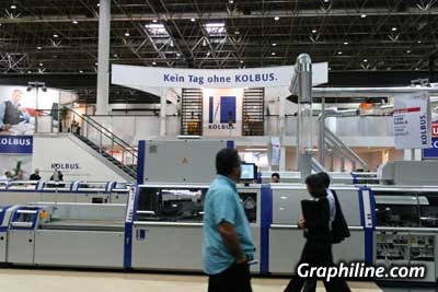 Photo Chane de brochage Kolbus KM 600 - Drupa